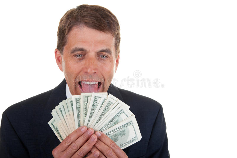 A greedy businessman licking money.